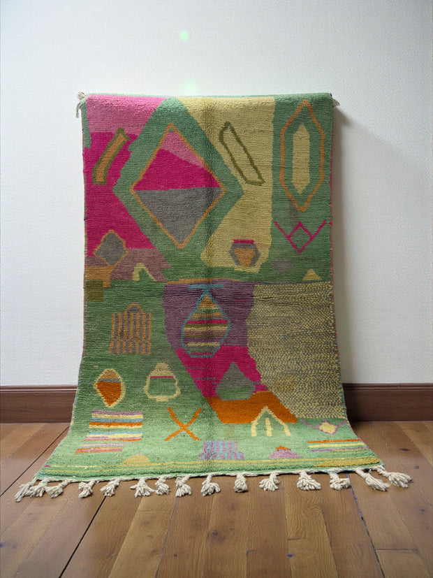 Handwoven Moroccan Bjaad carpet with abstract garden-inspired geometric motifs in multicolor wool, 250 × 150 cm