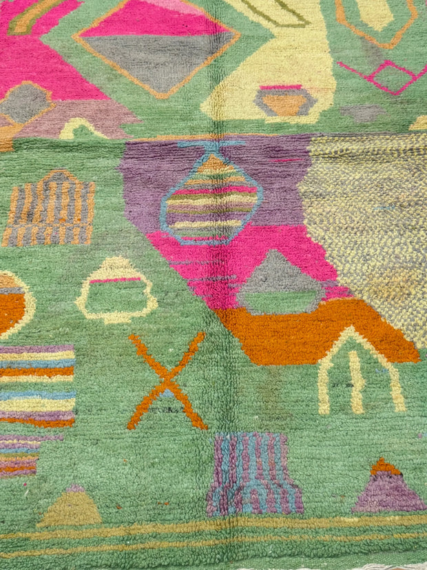 Handwoven Moroccan Bjaad carpet with abstract garden-inspired geometric motifs in multicolor wool, 250 × 150 cm