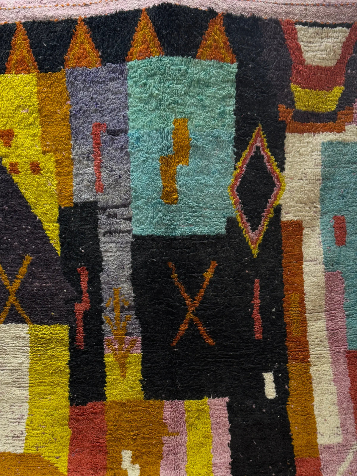 Handwoven Moroccan Bjaad carpet with abstract village geometric pattern in natural wool, 264 × 169 cm