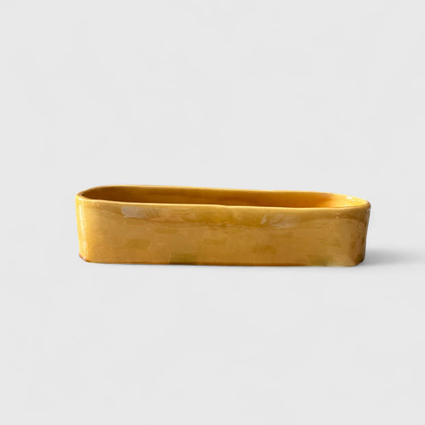 yellow glazed serving dish 
