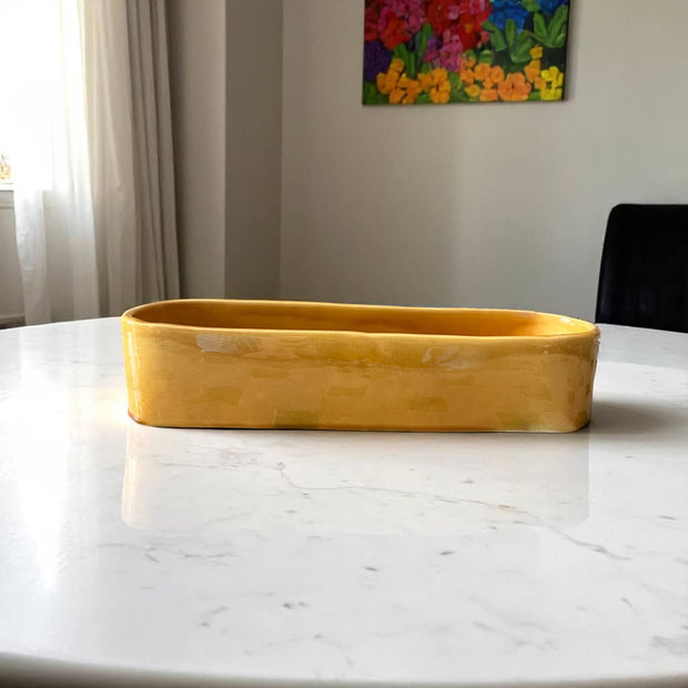 yellow glazed serving dish 