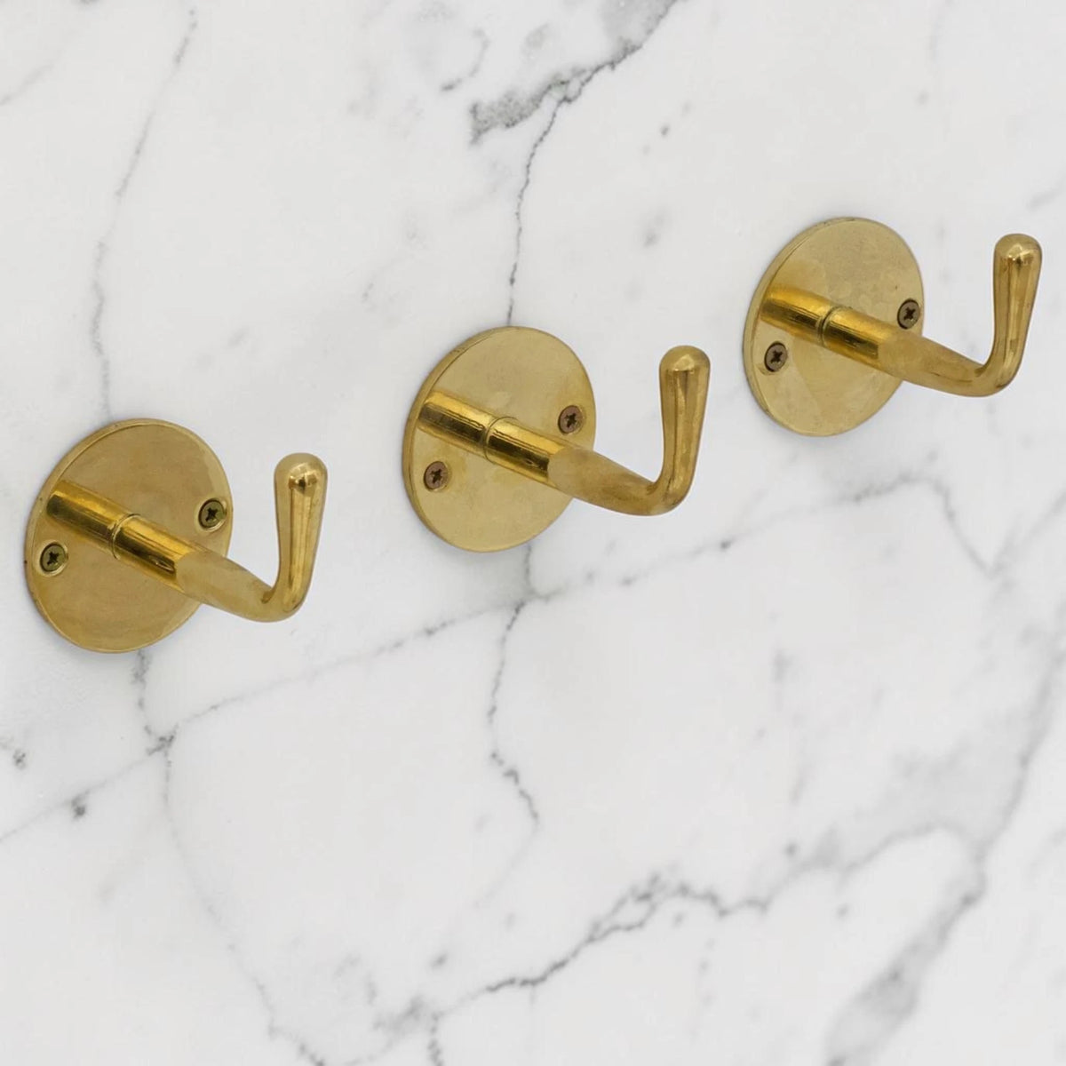 unlacquered solid brass wall hook minimalist design