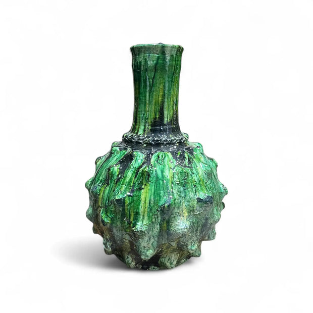 Green textured vase on a white background