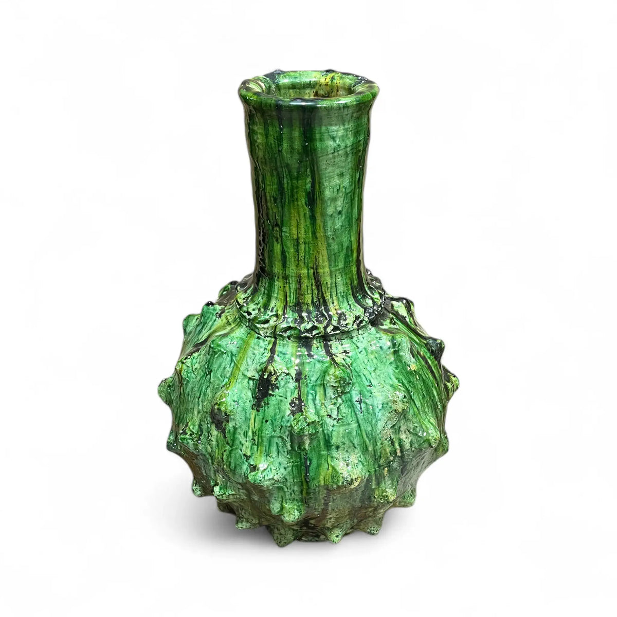 Green textured vase on a white background