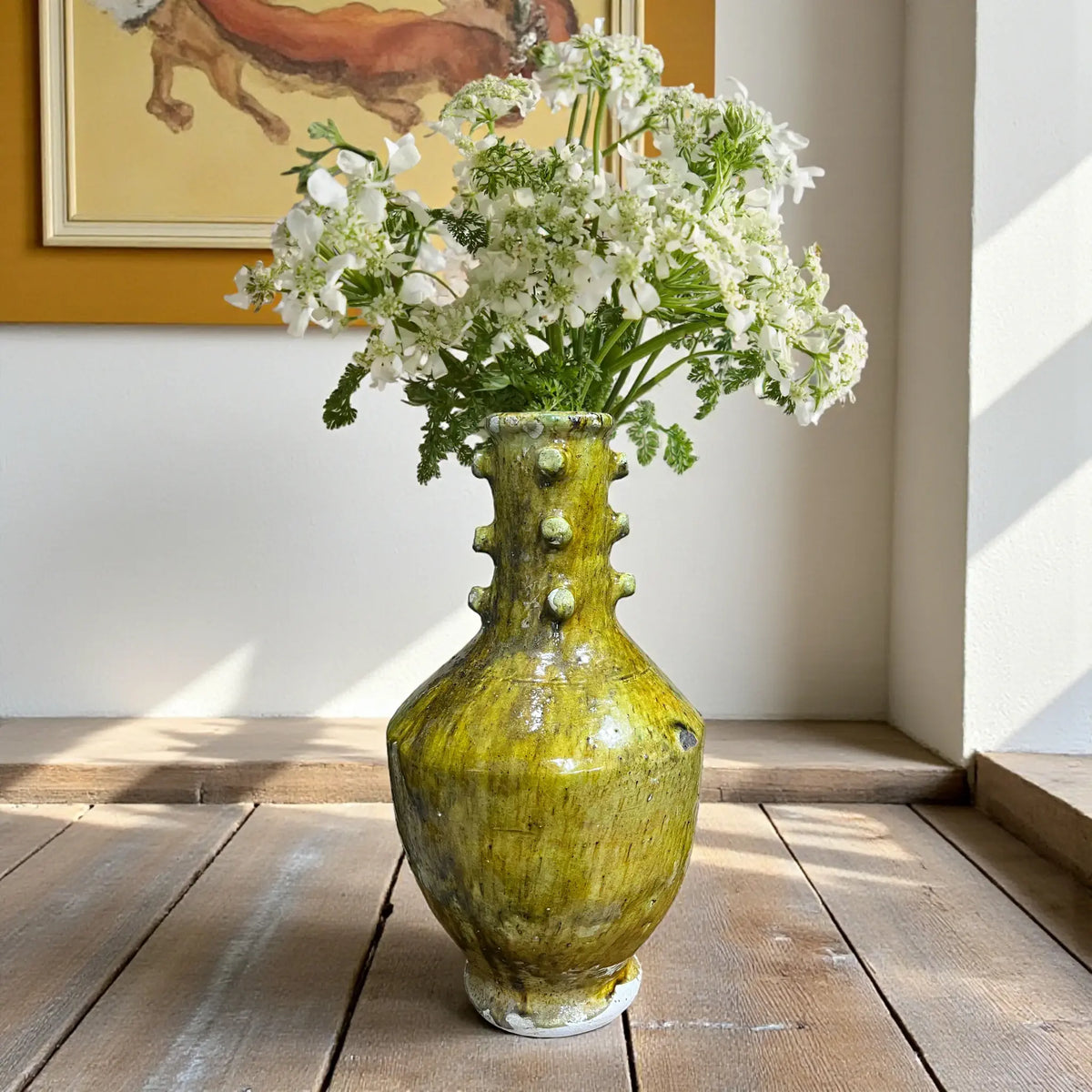 Handmade yellow Tamegroute vase with decorative knobs on the neck, Moroccan pottery