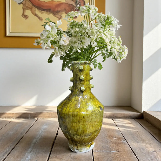 Handmade yellow Tamegroute vase with decorative knobs on the neck, Moroccan pottery