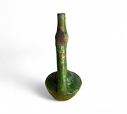 Green ceramic vase on a white background