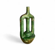 Green ceramic vase on a white background