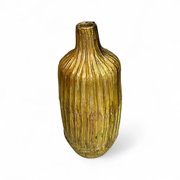 Decorative vase with a textured surface on a white background