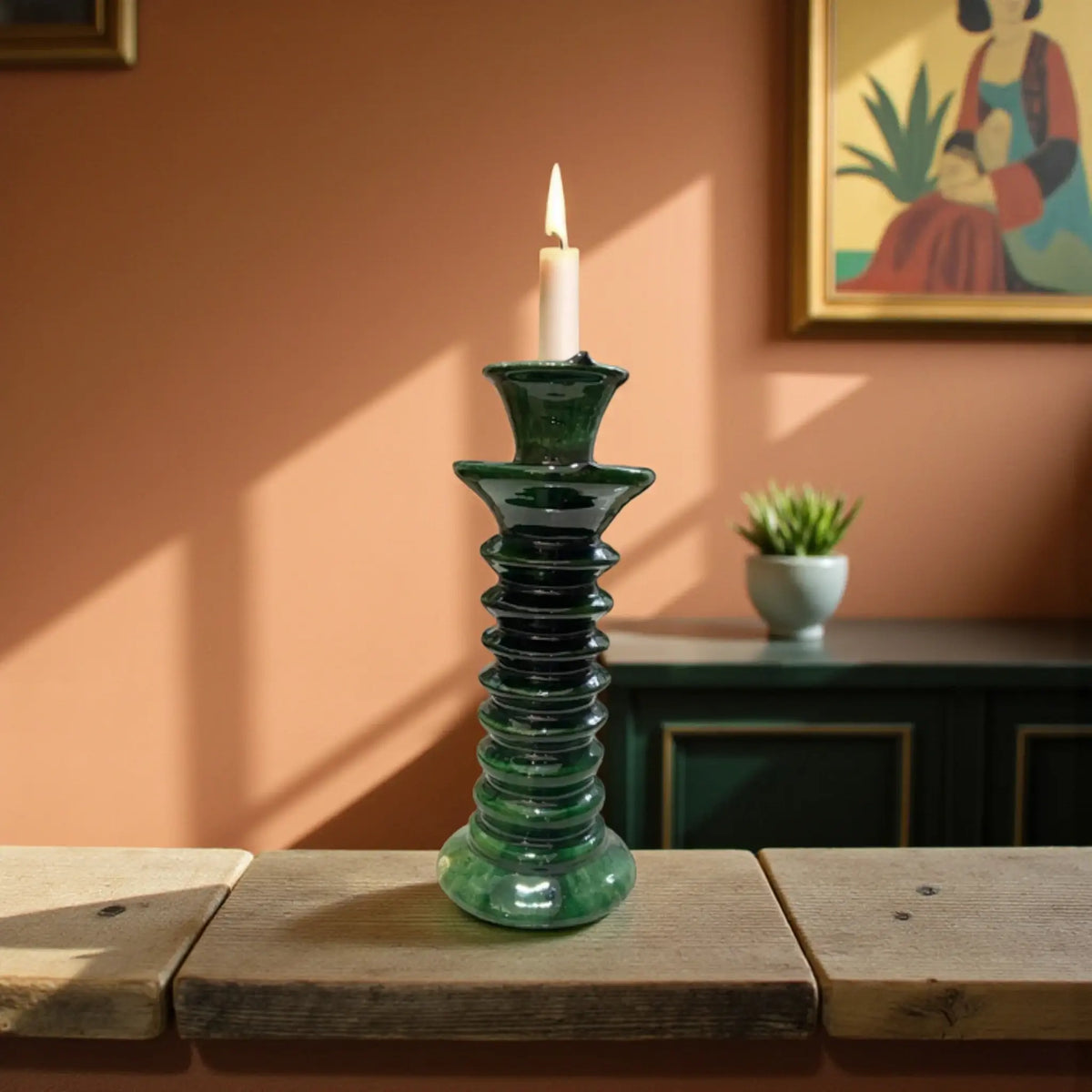 Handmade Tamegroute candleholder in glossy green glaze. 20 cm tall, crafted in Morocco using traditional pottery techniques. Rustic, artisan décor for modern homes.