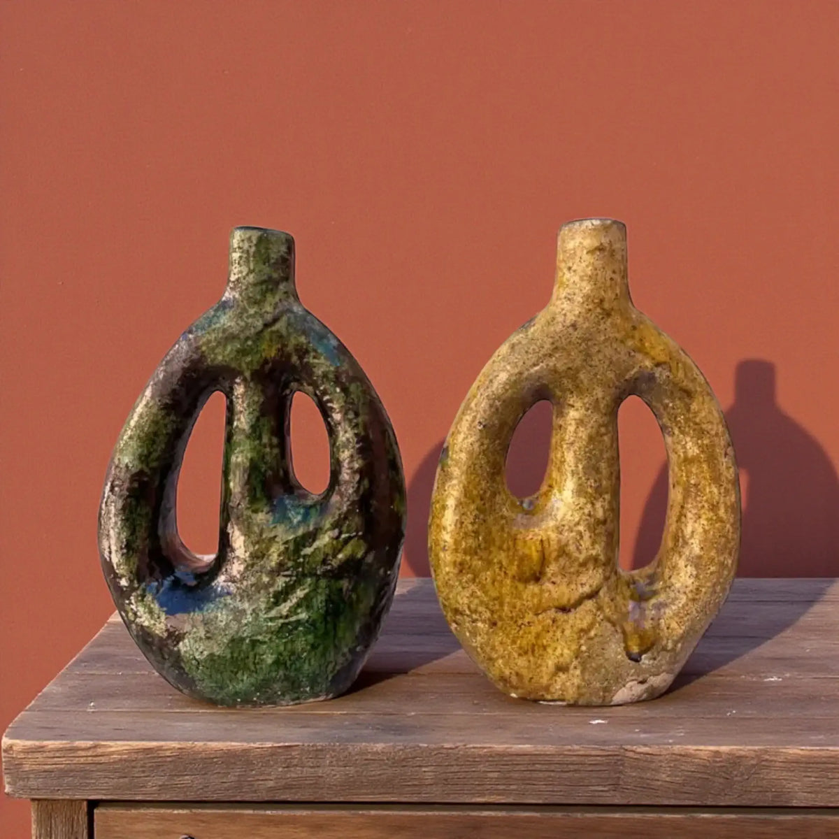 Handcrafted Tamegroute sculptural vase with open-form design in green and ochre glaze