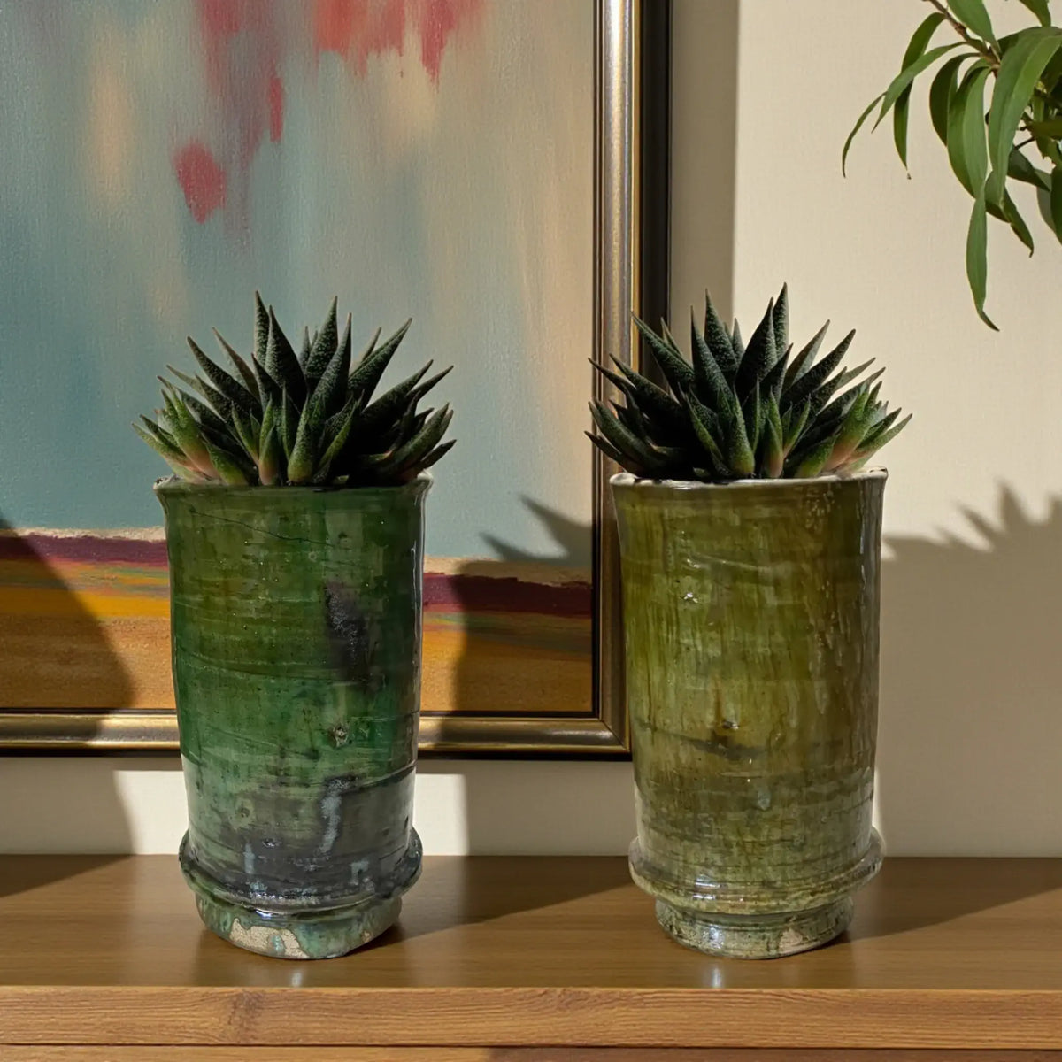 Handmade Tamegroute ceramic vase with green and ochre glaze, cylindrical shape, fired in a traditional Moroccan wood kiln, 22 cm tall