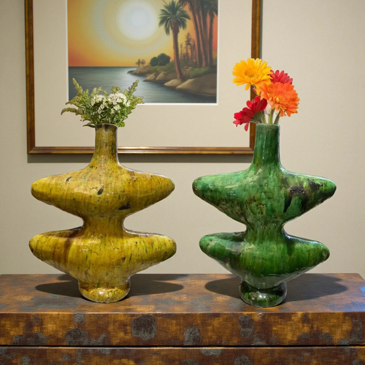 Handmade Tamegroute ceramic vase with sculptural form and natural green and ochre glaze, crafted in Morocco