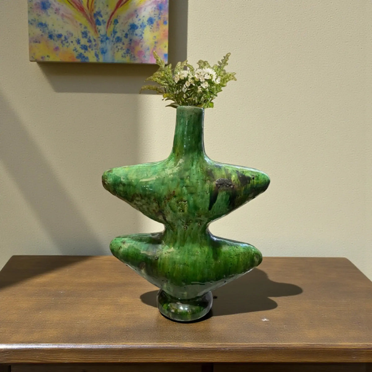 Handmade Tamegroute ceramic vase with sculptural form and natural green  glaze, crafted in Morocco