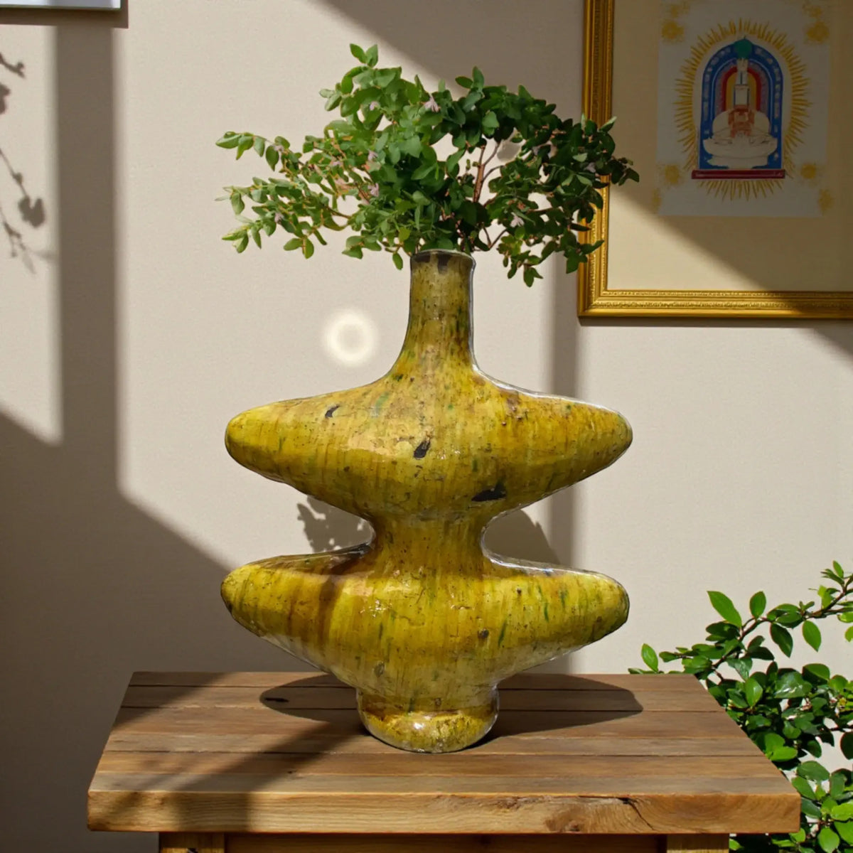 Handmade Tamegroute ceramic vase with sculptural form and natural ochre glaze, crafted in Morocco