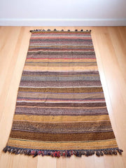 Bring Earthy Warmth Home with This Handwoven Moroccan Kilim Rug (9.0 x 4.8 ft)