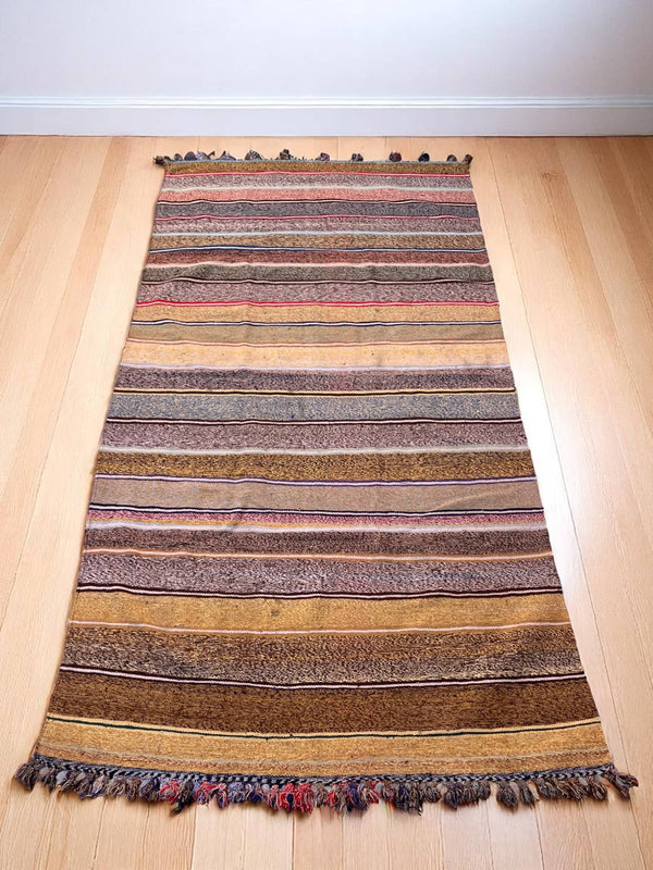 Bring Earthy Warmth Home with This Handwoven Moroccan Kilim Rug (9.0 x 4.8 ft)