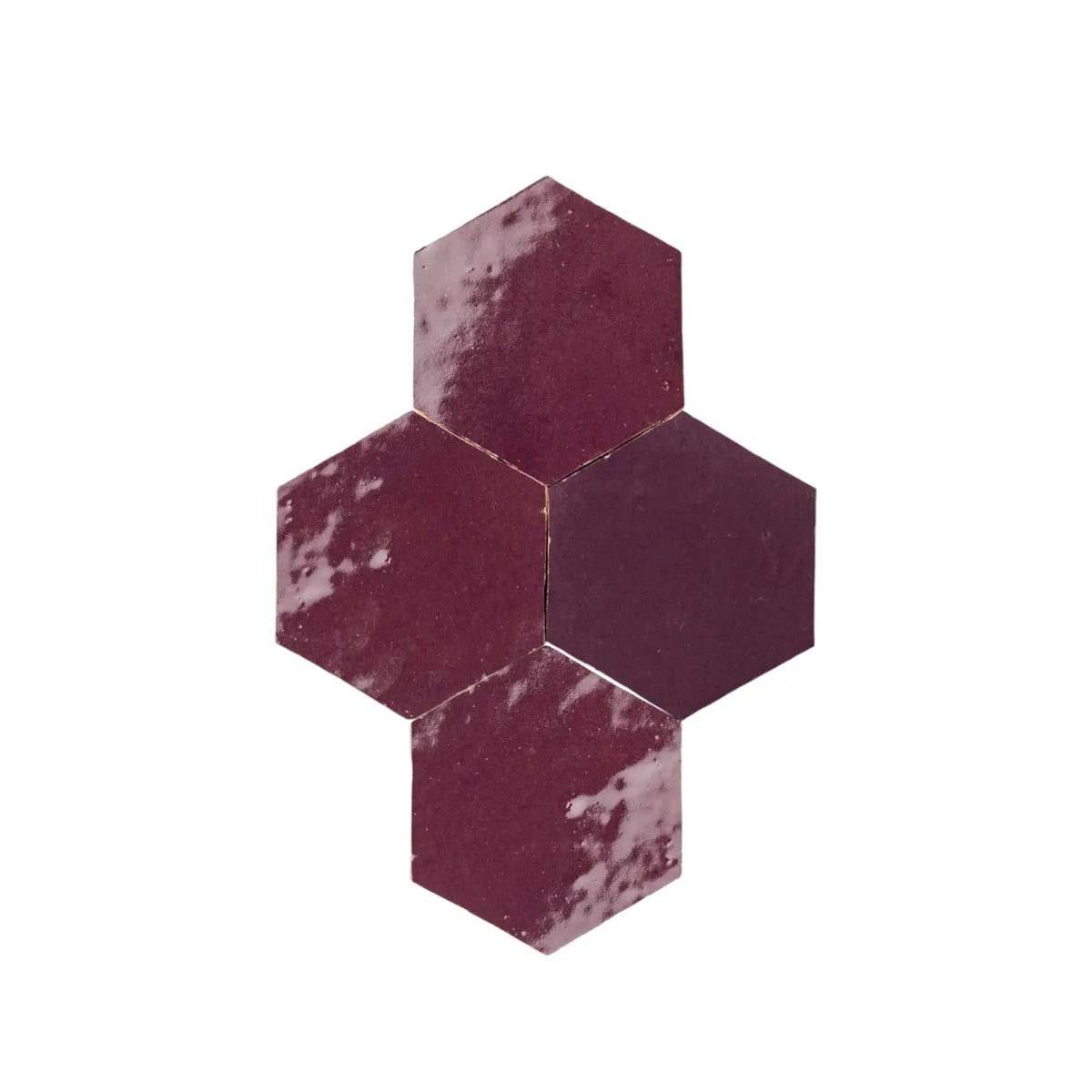 Handmade Moroccan hexagon zellige tile in deep burgundy glazed terracotta