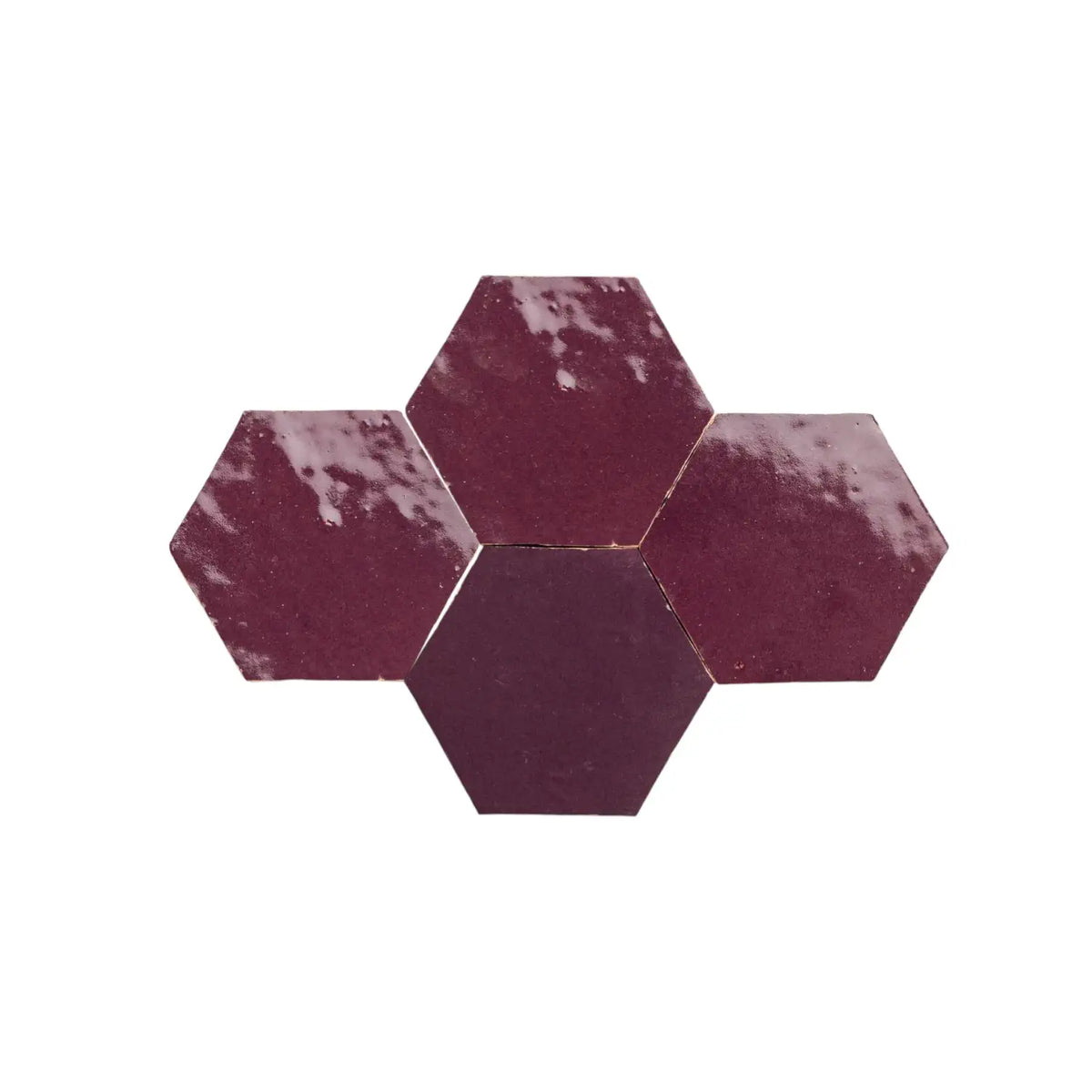 Handmade Moroccan hexagon zellige tile in deep burgundy glazed terracotta